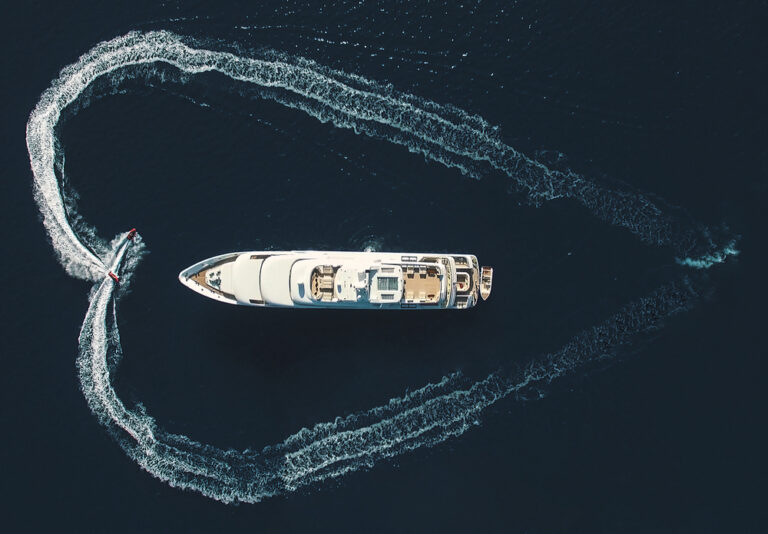 A luxury yacht sailing on the ocean.