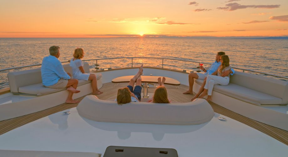 Yacht Ownership | YATCO A family on a private vessel.